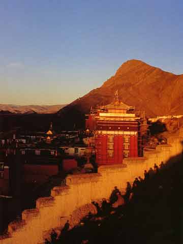 
Pilgrims circumambulate Tashilhunpo Monastery in Shigatse - My Tibet (Galen Rowell) book
